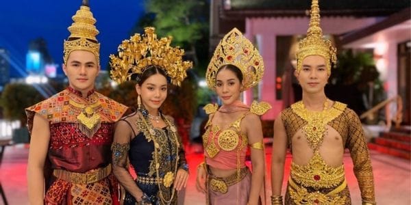 Event hostess wearing traditional Thai heritage costume for corporate event in Thailand